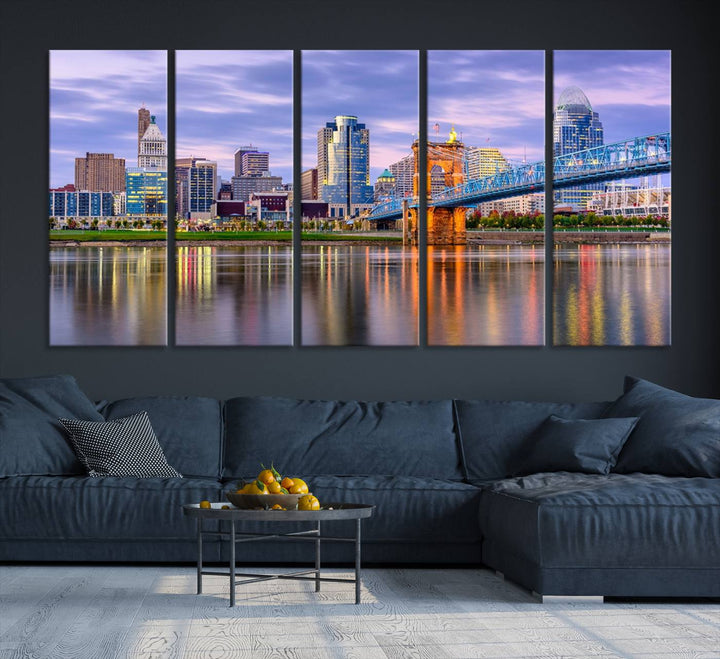 The wall art titled "Cincinnati City Lights Sunset Purple Cloudy Skyline Cityscape View" is beautifully printed on museum-quality canvases with a UV-protective coating and is ready to hang.