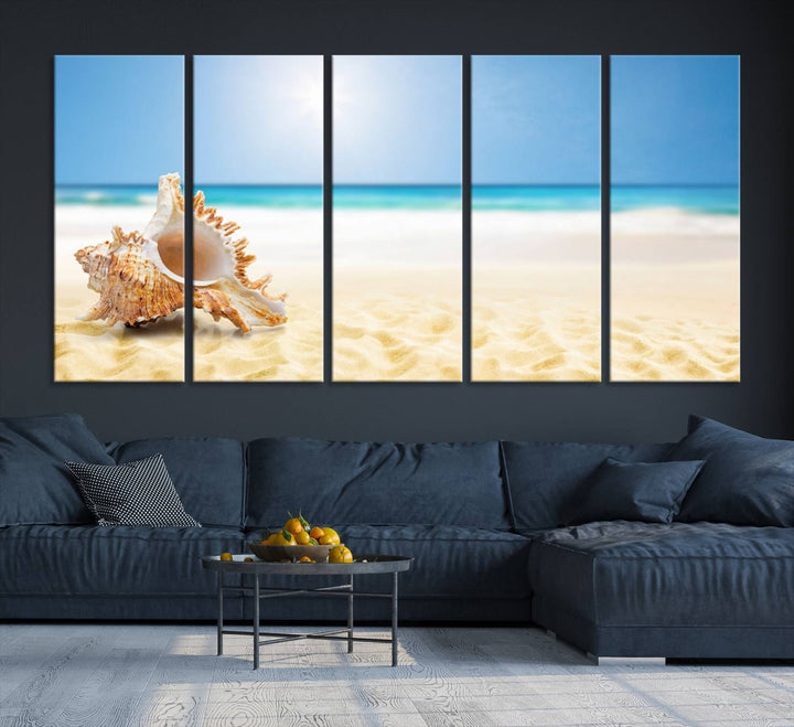 The Sea Shell on The Beach Sun Sand Wall Art Canvas Print is a triptych that beautifully captures a beach scene with a large seashell on the sand.