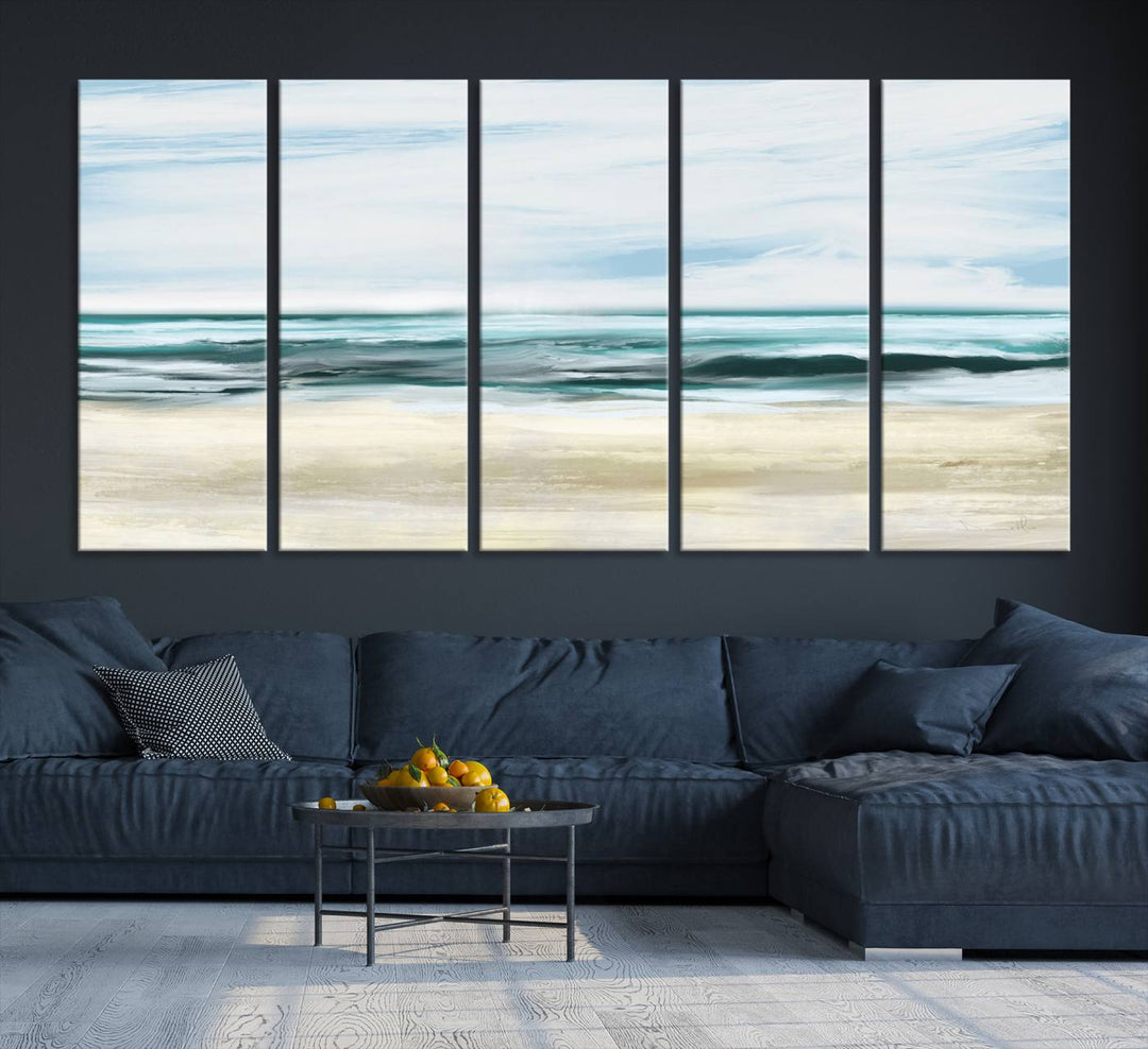 The room features the Ocean Abstract Wall Art Canvas Print, a triptych beach painting on museum-quality canvas with a gallery-wrapped finish and UV-protective coating.