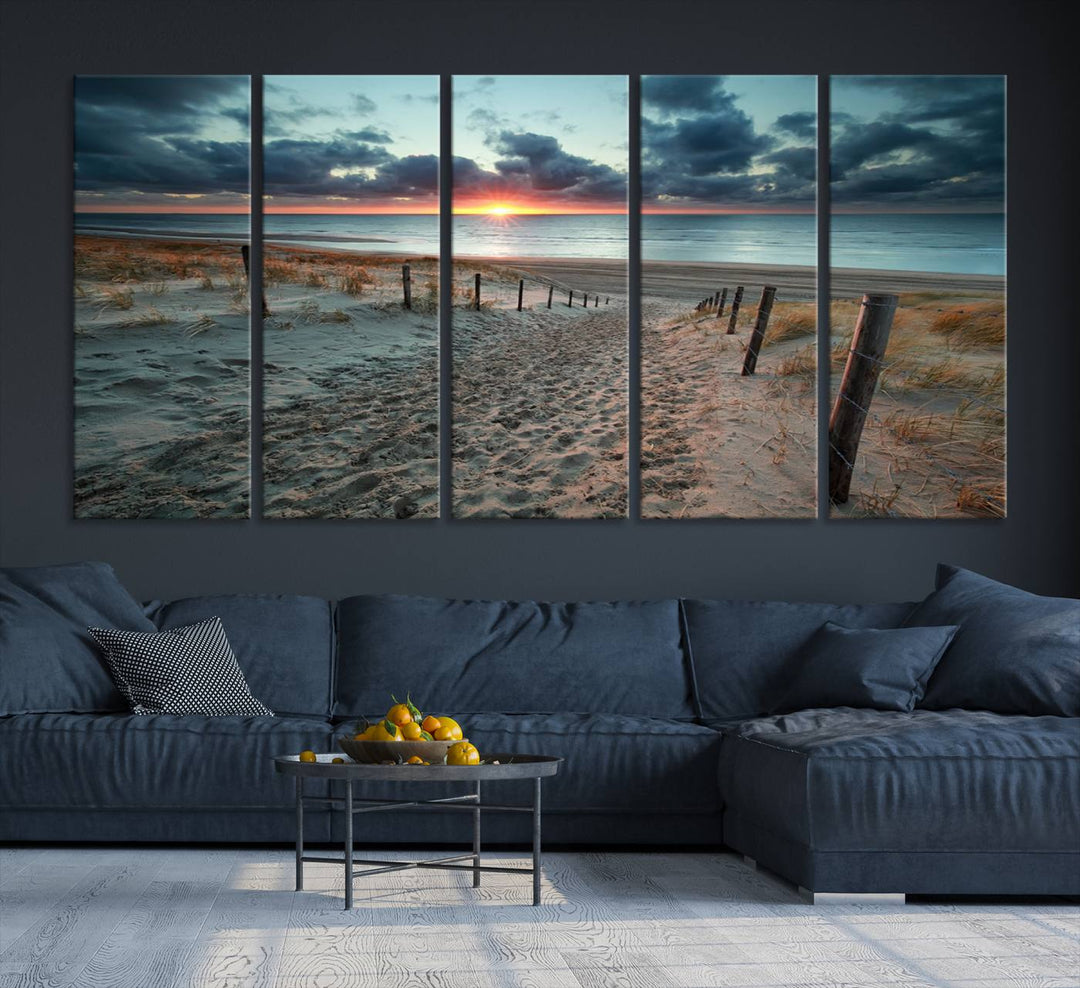 The modern living room features the Cloudy Weather Sunset Beach Wall Art Canvas Print. This museum-quality canvas adds a touch of sophistication with its hand-assembled framed art, ensuring lasting elegance. Enjoy free shipping on this exquisite piece.