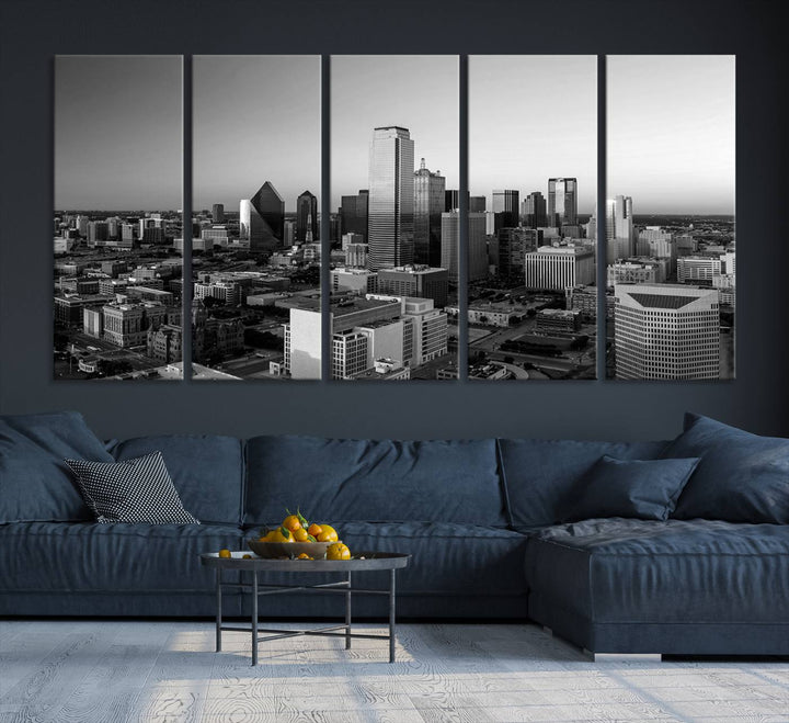 A modern living room showcases the Dallas City Lights Skyline Black and White Wall Art Cityscape Canvas Print. This gallery-wrapped piece offers a sleek finish and is crafted from museum-quality pollycotton. It features a UV-protective coating to ensure lasting vibrancy.