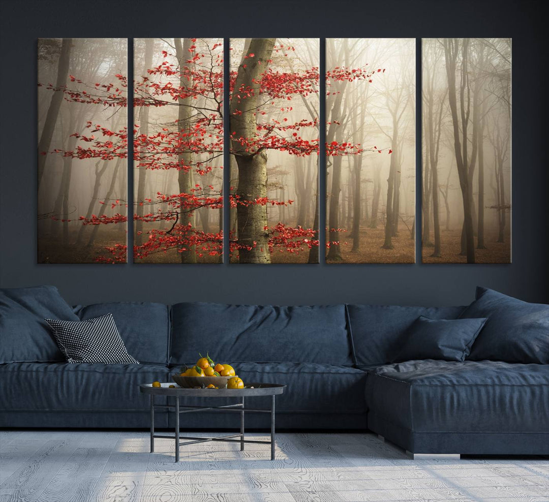 The living room features the Foggy Forest Wall Art, an Autumn Trees Canvas Print that showcases a serene nature scene with foggy woodland decor and a tree adorned in vibrant red leaves.