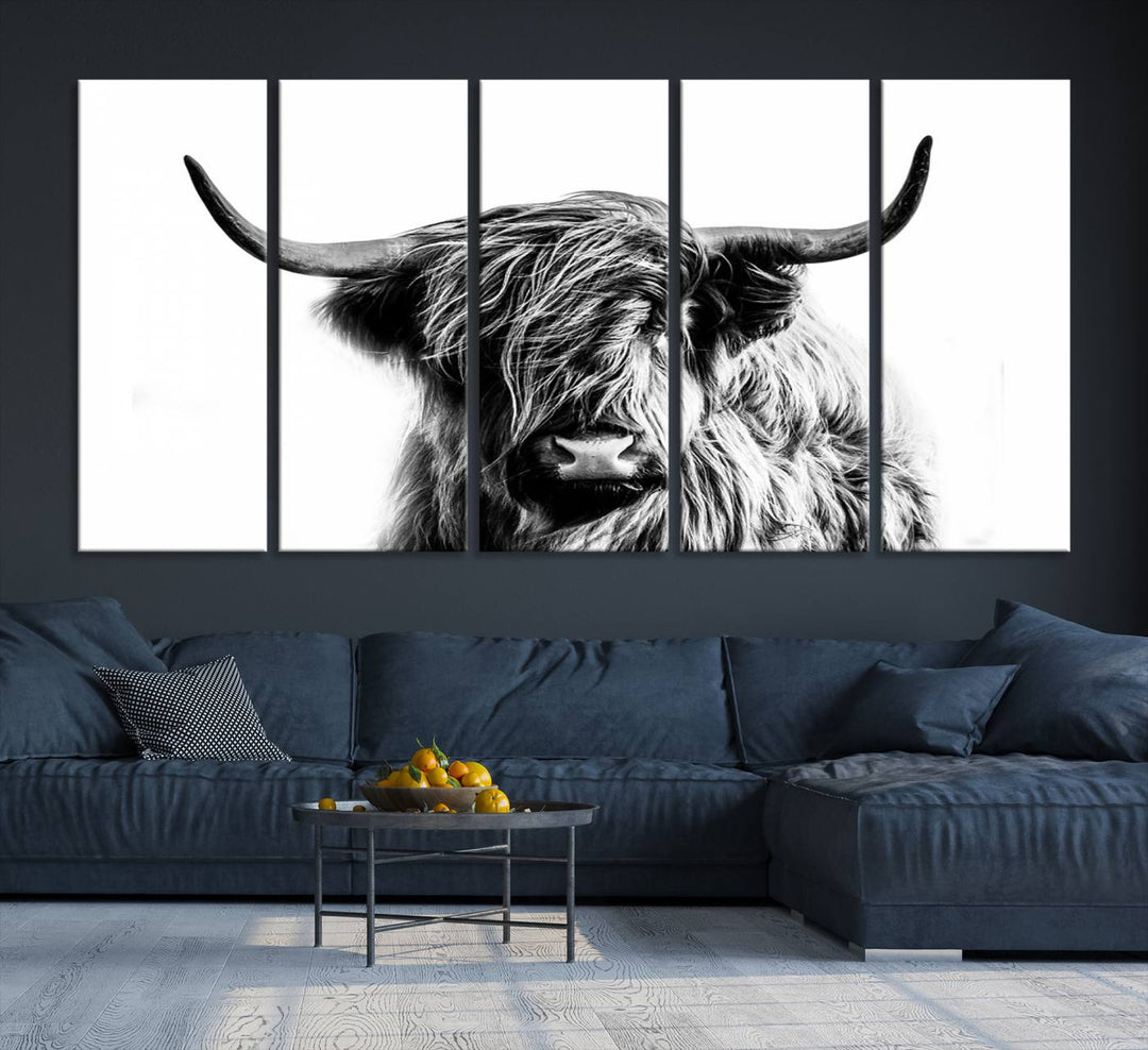 The Scottish Highland Cow Cattle Art Print Farmhouse Wall Art Canvas Print enhances rustic farmhouse decor with its depiction of a long-haired, large-horned cow. This triptych is an ideal choice for chic wall art.