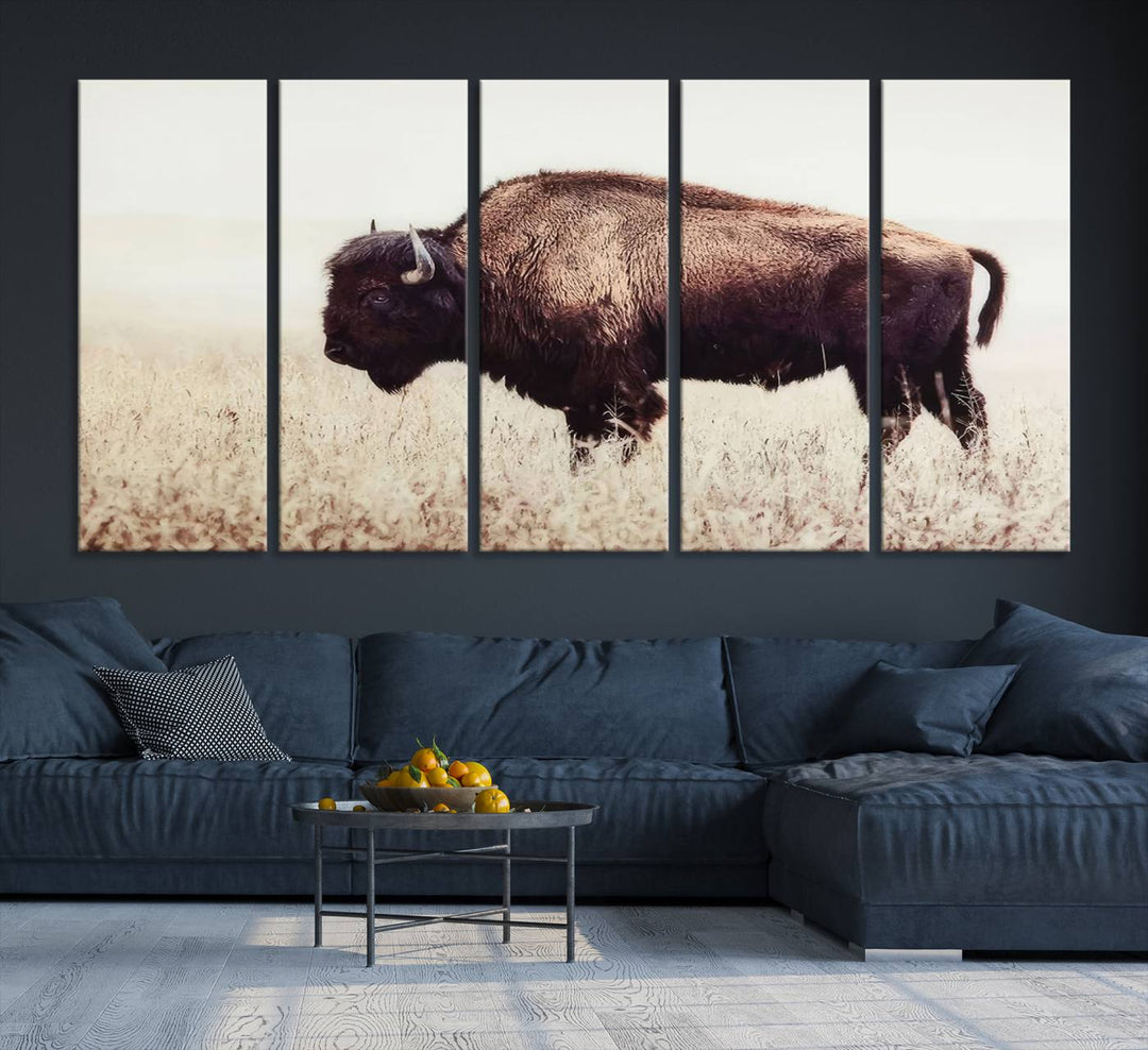 A stylish living room showcases the captivating "Bison in Field" Wall Art Canvas Print as farmhouse decor.