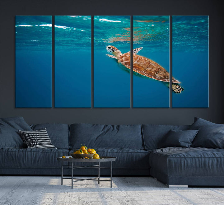 The living room features the "Baby Turtle in Ocean" wall art canvas print. This gallery-quality piece, depicting a sea turtle swimming underwater, adds an elegant touch to the space.