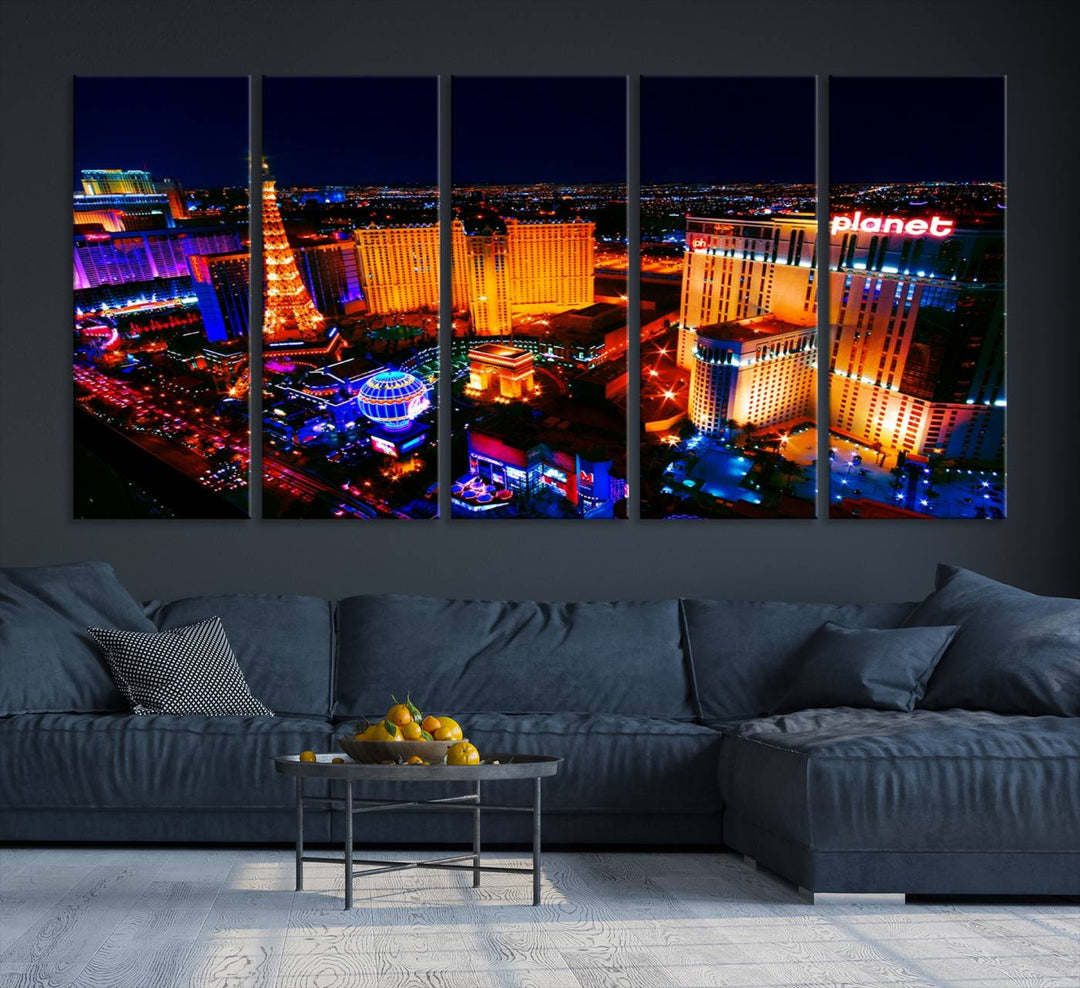 Las Vegas Wall Art Canvas Print showcases a dynamic and luminous cityscape at night with tall buildings and bustling streets. Expertly printed on museum-quality canvas, this gallery-wrapped artwork is enhanced with a UV-protective coating to ensure lasting brilliance.