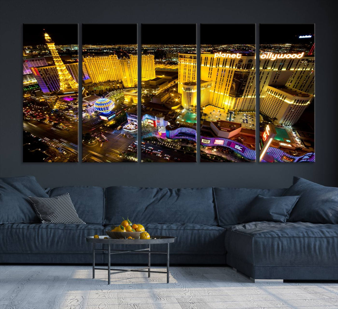 The modern living room features a Las Vegas Wall Art Canvas Print, a museum-quality triptych showcasing a vibrant cityscape with neon lights.