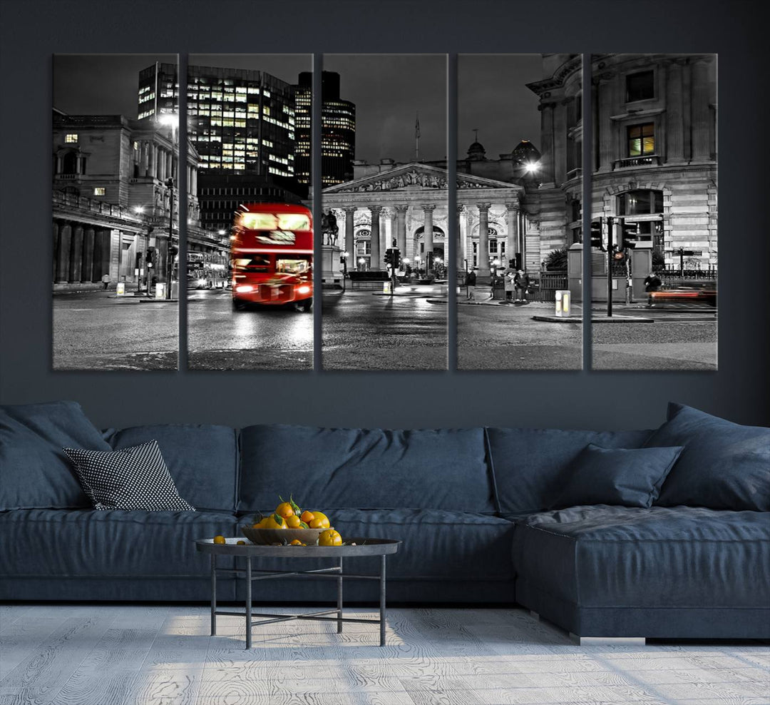 The London Night Red Bus Wall Art Canvas Print features a black and white cityscape with a moving red double-decker bus, crafted on museum-quality canvas with a UV-protective coating. This ready-to-hang artwork is designed to stand out and enhance any space.