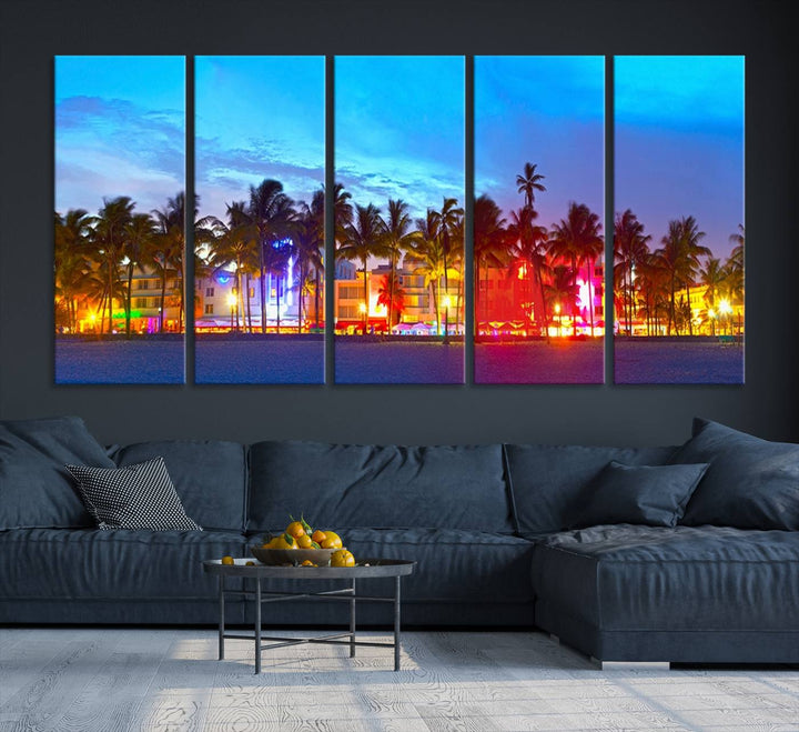 The living room features a three-panel Miami City Wall Art Canvas Print, showcasing a colorful, illuminated beach scene with palm trees on museum-quality canvas.