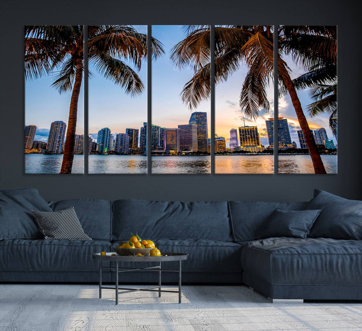 The Wall Art MIAMI Canvas Print features a triptych design depicting palm trees and a city skyline at sunset.