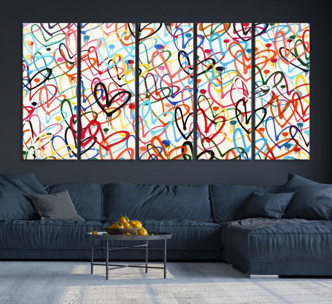 The "Colorful Love Canvas print," featuring vibrant abstract street art with overlapping loops, is handmade in the USA.