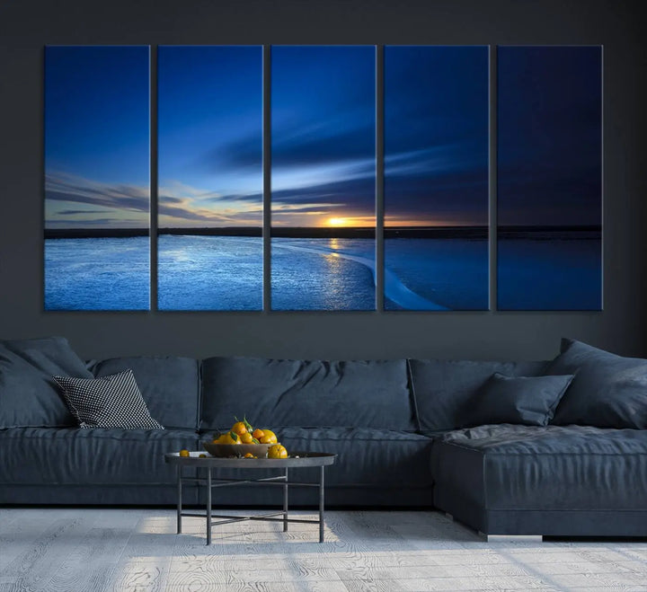 The living room features a triptych of the Wall Art Canvas Print Navy Sunset Lake Landscape Artwork, adding to its tranquil vibe.