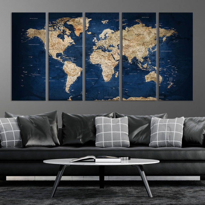 A triptych canvas print titled "Vintage Blue World Map Canvas Print - Classic World Map Design on Deep Blue Wall Art Print" adorns the wall, enhancing the decor with its antique style.