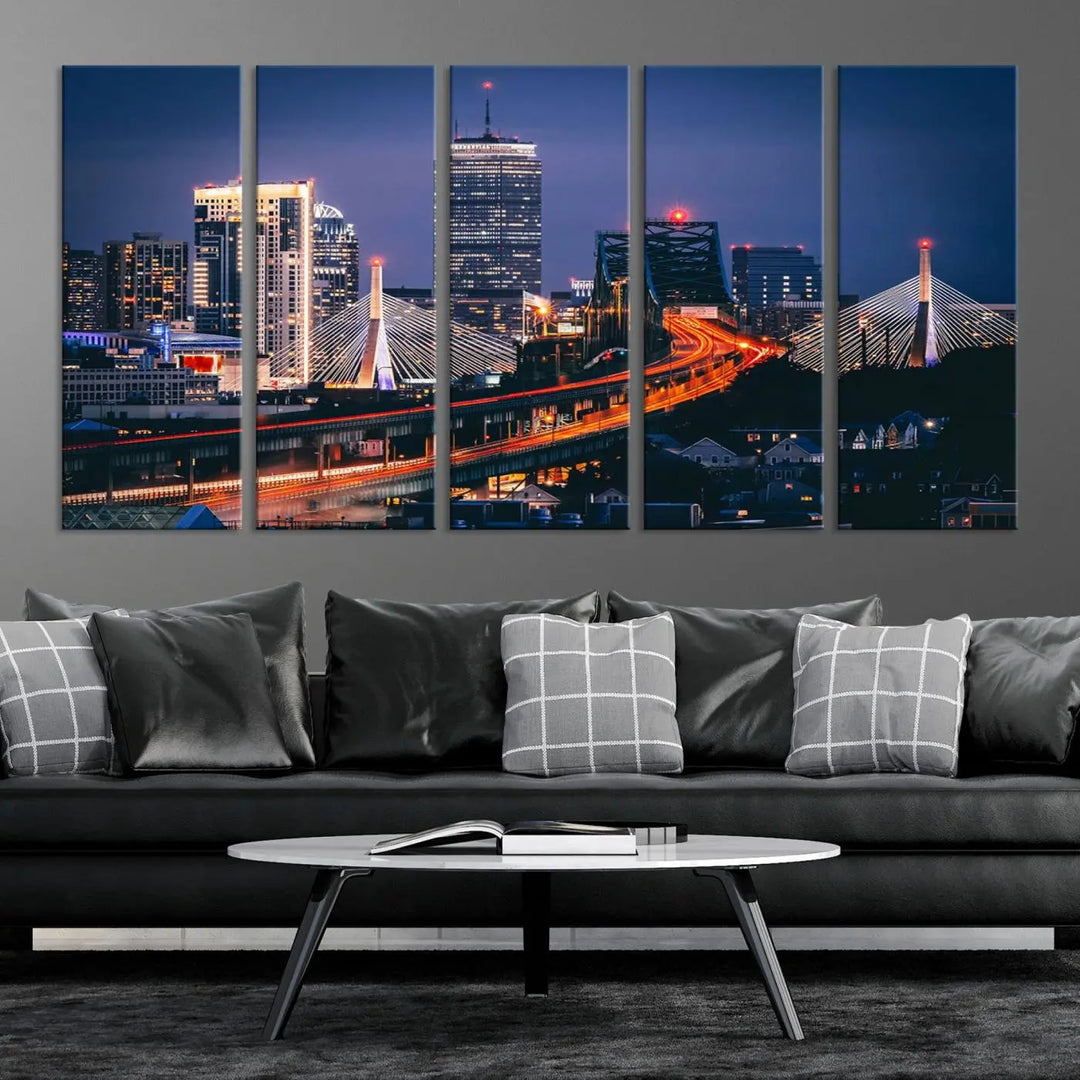 The "Boston City Lights Night Skyline Cityscape View" artwork on the wall showcases a brightly lit bridge at night. It is displayed on museum-quality canvas with a UV-protective coating.