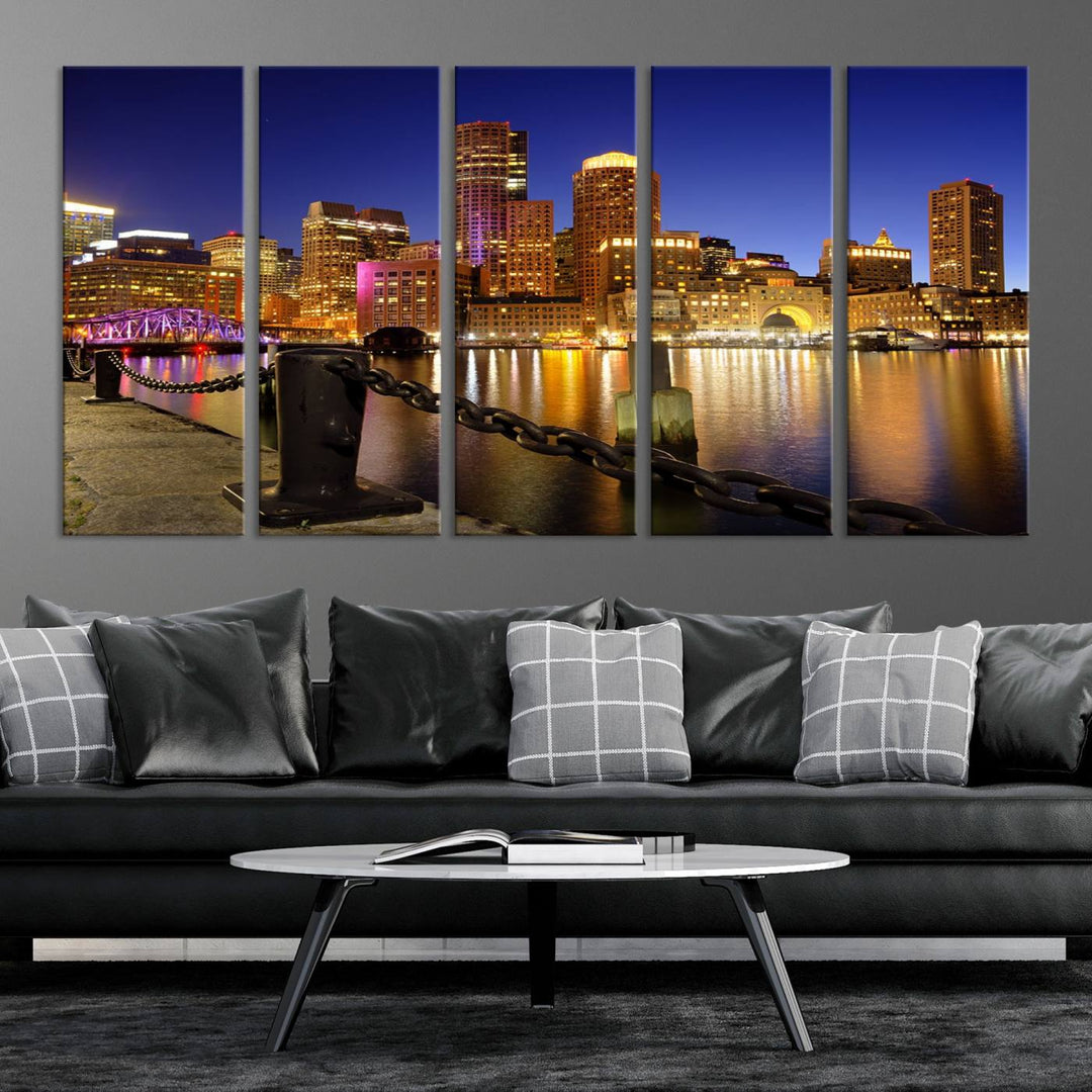 The "Boston City Night Skyline Cityscape View Wall Art Canvas Print" beautifully portrays a stunning triptych of a city skyline illuminated against the night sky, elegantly reflected in the river below. These museum-quality canvases are gallery wrapped to ensure an elegant presentation that enhances any space.