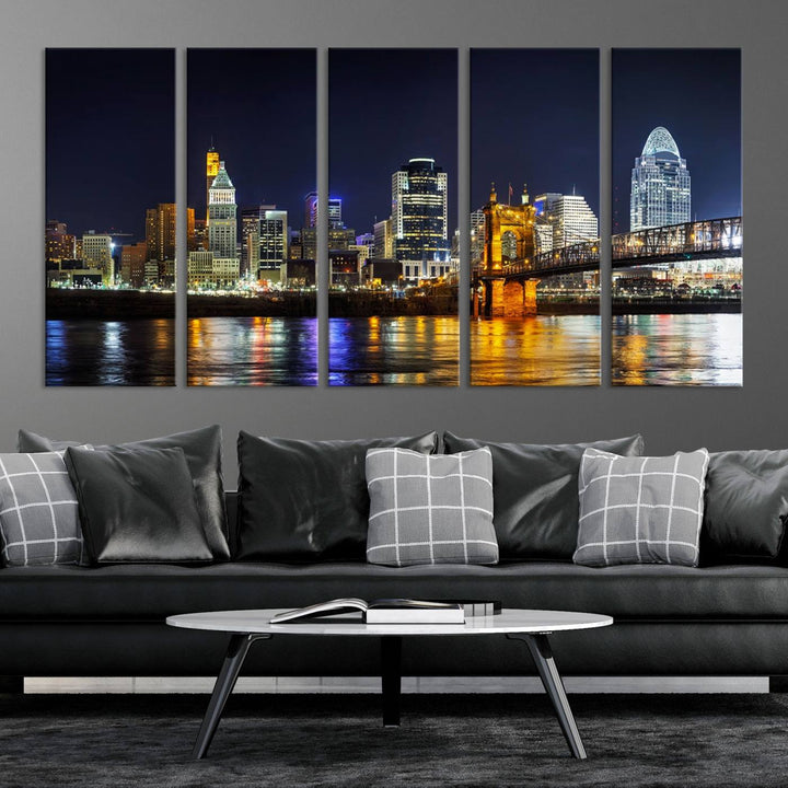 The Cincinnati City Lights Night Skyline Cityscape View Wall Art Canvas Print, crafted on museum-quality canvas with UV-protective coating and ready to hang, adds a touch of sophistication to the wall.