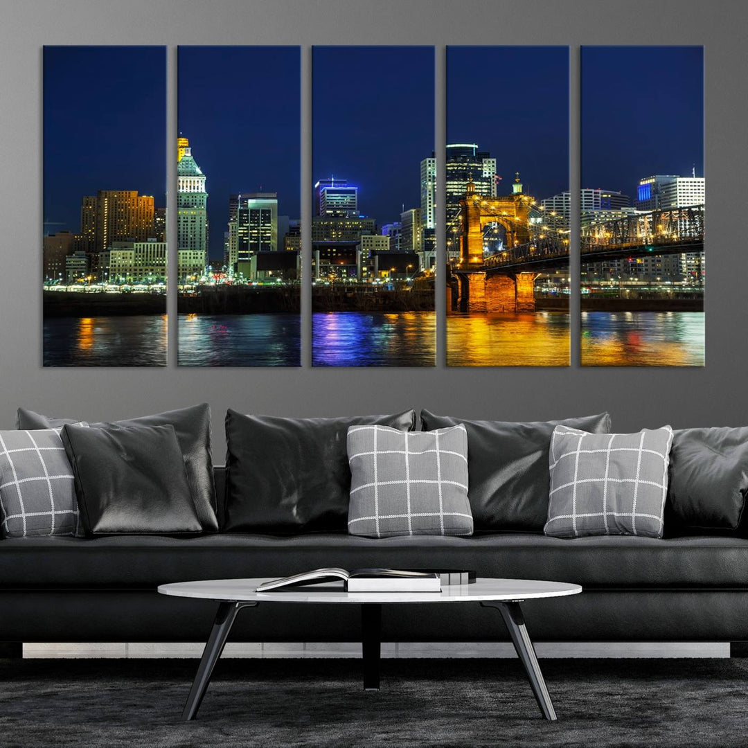 The "Cincinnati City Lights Night Skyline Cityscape" canvas print, displayed above a sofa, exhibits museum-quality craftsmanship with a UV-protective coating.