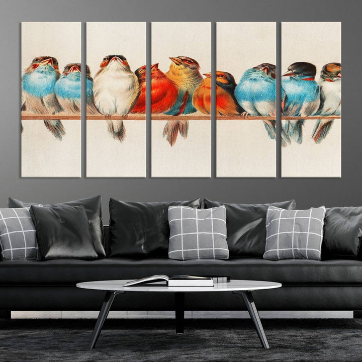 The Abstract Birds Wall Art Canvas Print, featuring a triptych of colorful birds perched on a branch, is printed on museum-quality canvas and equipped with a UV-protective coating and ready-to-hang design. This artwork adds vibrant elegance to your living space.