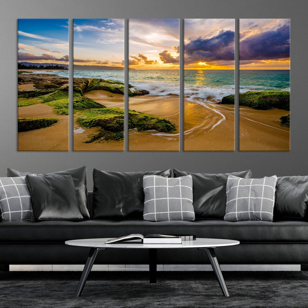 The Sunset Beach Wall Art Canvas Print is a gallery-wrapped triptych showcasing a beach scene with mossy rocks and a vibrant sunset. Made from museum-quality canvas and featuring a UV-protective coating, it elegantly provides both beauty and durability.