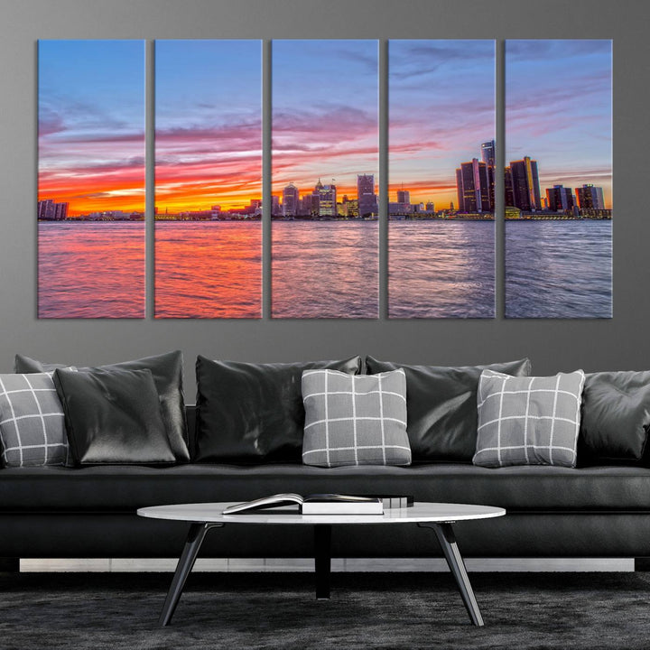 The Detroit City Lights Sunset Colorful Cloudy Skyline Cityscape View Wall Art Canvas Print showcases a vibrant city skyline at sunset over water. The artwork is museum-quality, comes ready to hang, and features a UV-protective coating to preserve its vivid colors.