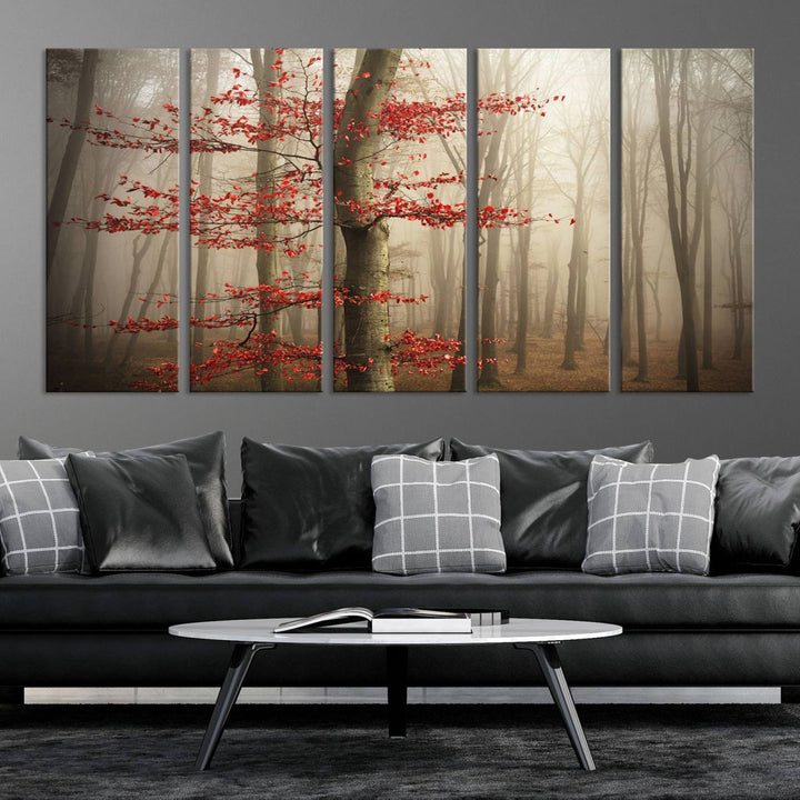 The living room features the Foggy Forest Wall Art, an Autumn Trees Canvas Print that showcases a serene nature scene with foggy woodland decor and a tree adorned in vibrant red leaves.