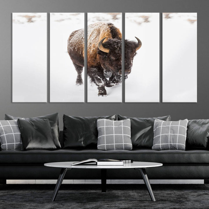 The Bison Winter Wall Art Canvas Print for Farmhouse Decor is displayed as a triptych in the living room. This artwork, printed on museum-quality canvases with a UV-protective coating to maintain its vibrant colors, is the focal point of the space.