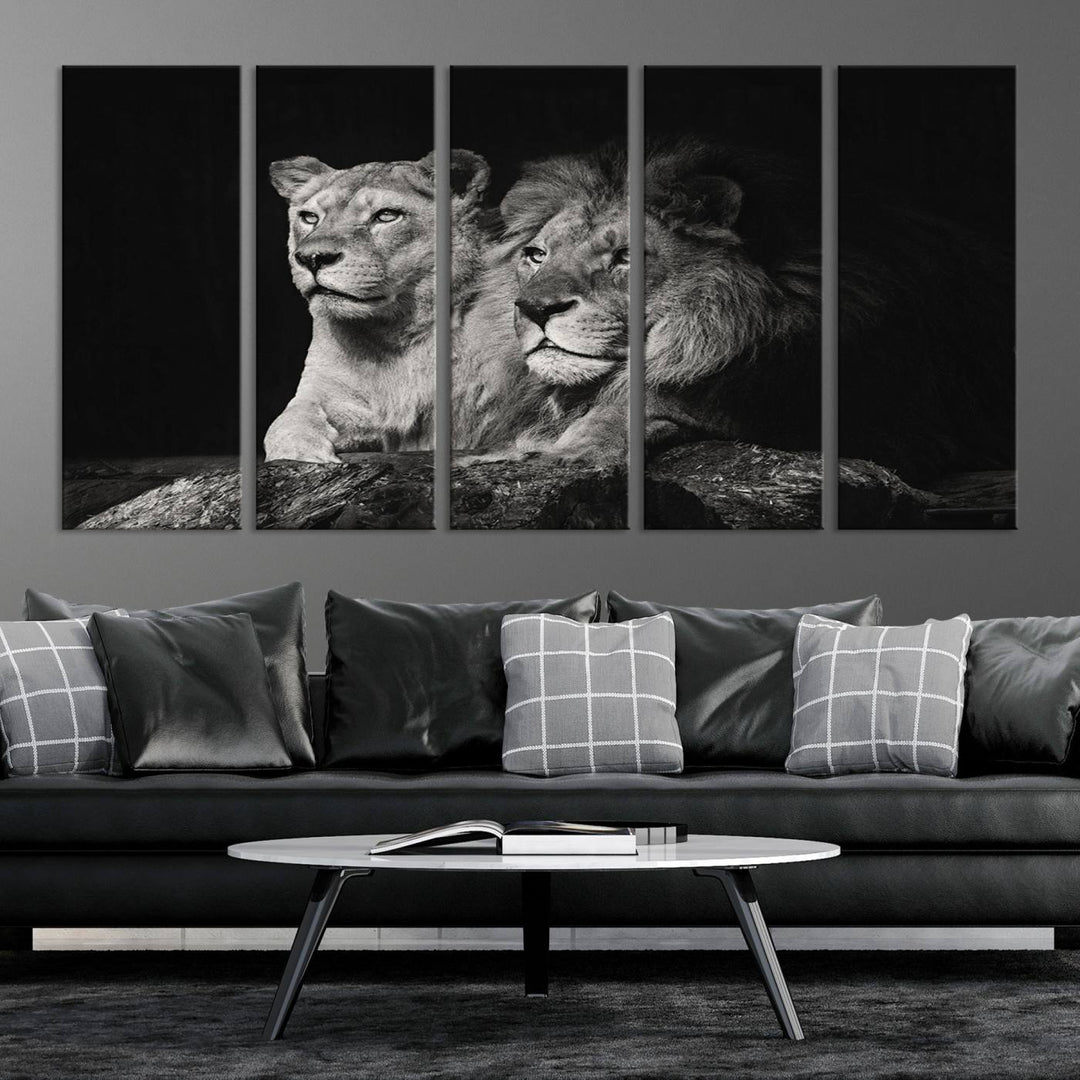 The elegant wildlife portrait, "Lion Couple Canvas Wall Art Print," featuring a black and white depiction of a lion family, majestically decorates the living room wall.