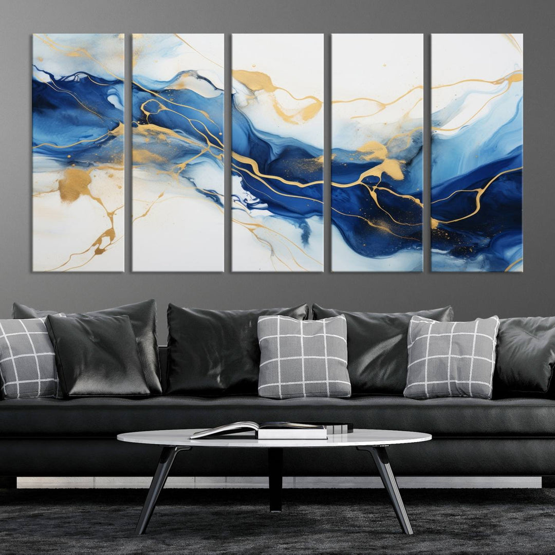 The Blue Abstract Wall Art is displayed as a triptych on museum-quality canvas, showcasing a blue and gold abstract design. The artwork includes a UV-protective coating to maintain its vibrancy and comes with the benefit of free shipping.