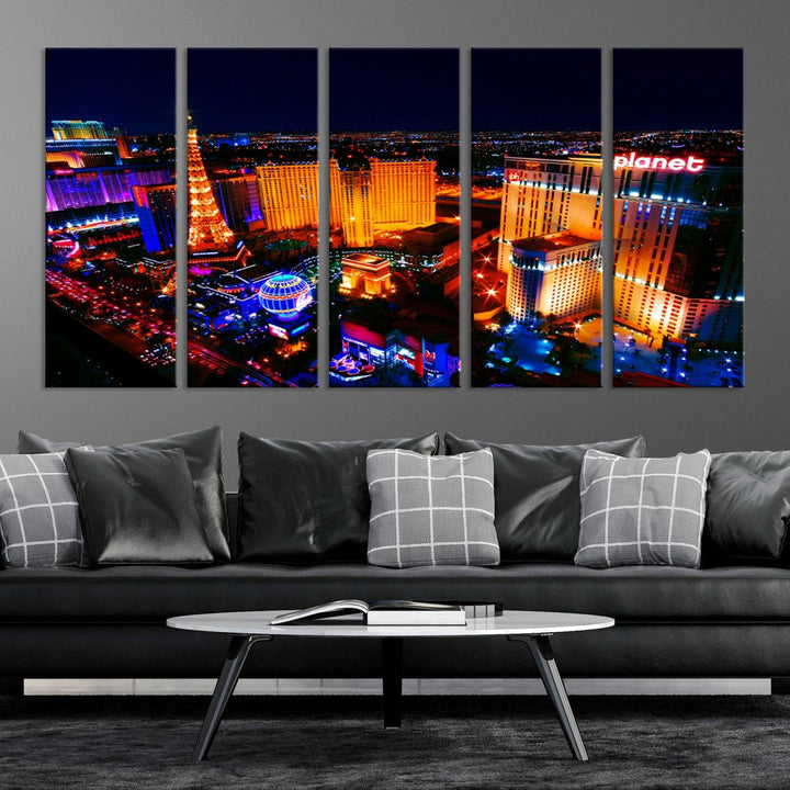 Las Vegas Wall Art Canvas Print showcases a dynamic and luminous cityscape at night with tall buildings and bustling streets. Expertly printed on museum-quality canvas, this gallery-wrapped artwork is enhanced with a UV-protective coating to ensure lasting brilliance.