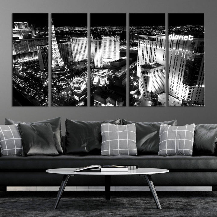 The Las Vegas Wall Art Canvas Print is a black and white triptych that showcases a city skyline at night. Crafted on museum-quality canvas with a UV-protective coating, it serves as an elegant and ready-to-hang focal point in the room.