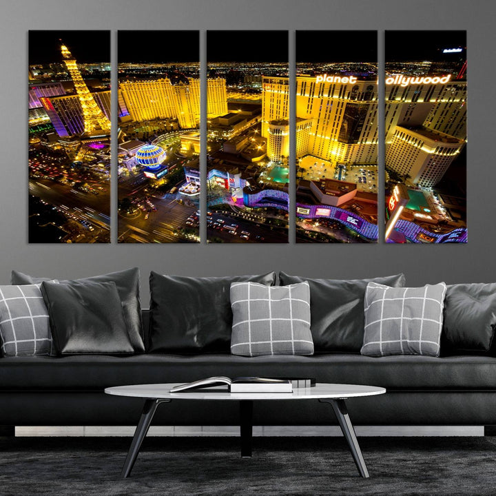 The modern living room features a Las Vegas Wall Art Canvas Print, a museum-quality triptych showcasing a vibrant cityscape with neon lights.