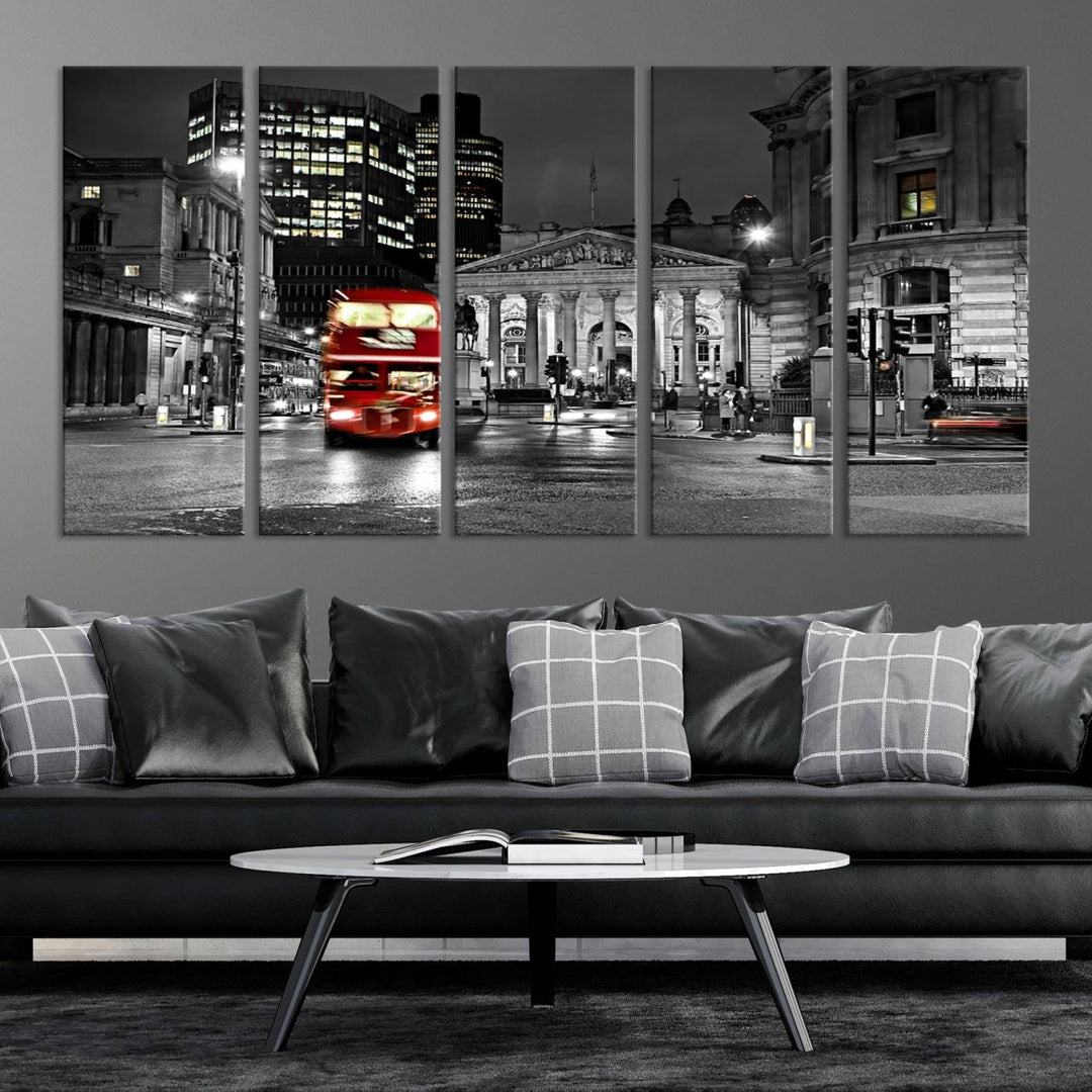 The London Night Red Bus Wall Art Canvas Print features a black and white cityscape with a moving red double-decker bus, crafted on museum-quality canvas with a UV-protective coating. This ready-to-hang artwork is designed to stand out and enhance any space.