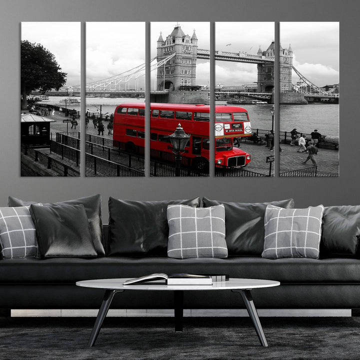 The London Red Bus and Bridge Wall Art Canvas Print showcases a red London bus in front of Tower Bridge, beautifully presented as a gallery-wrapped canvas. This striking image is divided into three panels, delivering a museum-quality display that's ready to hang.