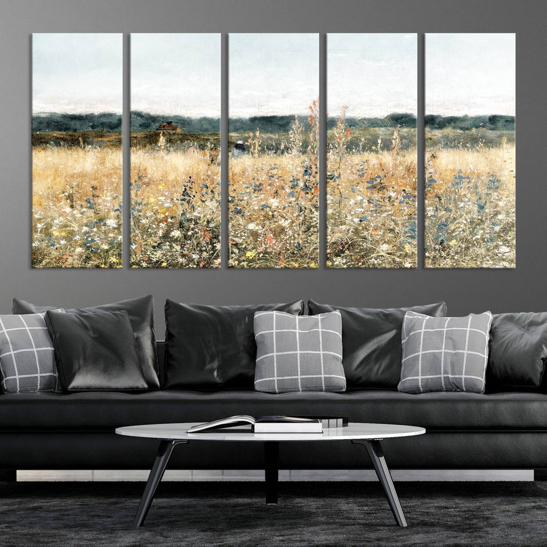 The "Wildflower Field Wall Art Canvas" brings rustic charm to the room with its nature-inspired landscape print, making it a perfect addition to the living room or office.