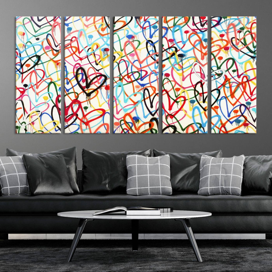 The "Colorful Love Canvas print," featuring vibrant abstract street art with overlapping loops, is handmade in the USA.