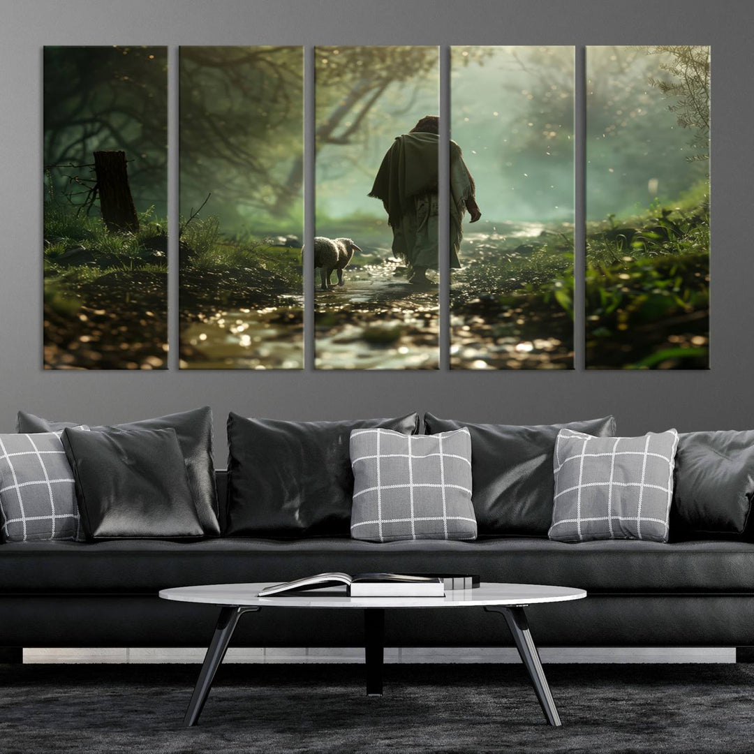 The wall art piece, titled "Jesus Shepherd a Lost Lamb Canvas Wall Art Print," is suspended on the wall and depicts a robed figure and a lamb wandering along a forest path.