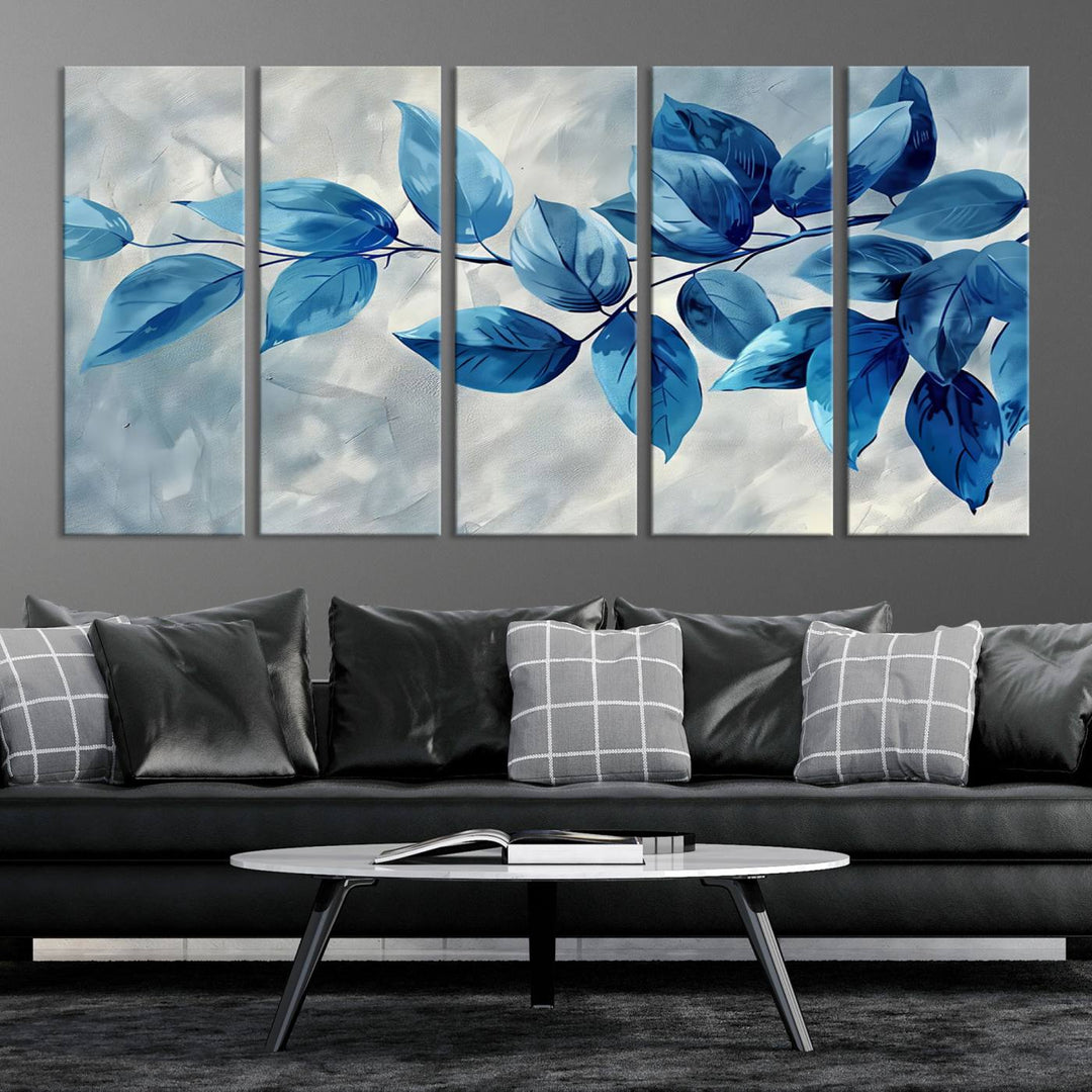 A Blue Leaf Abstract Wall Art Canvas Print, featuring a textured background and gallery-quality finish, is displayed.