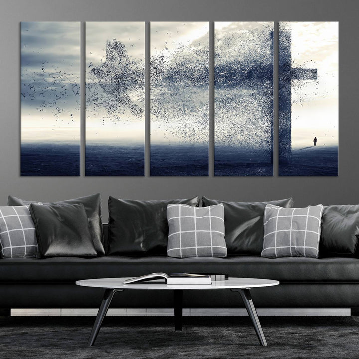 The "Jesus and the Fading Cross – Symbol of Faith" framed canvas print beautifully depicts a cross formed by birds against a moody sky above an ocean. This piece of Christian wall art infuses spirituality into the minimalist space.