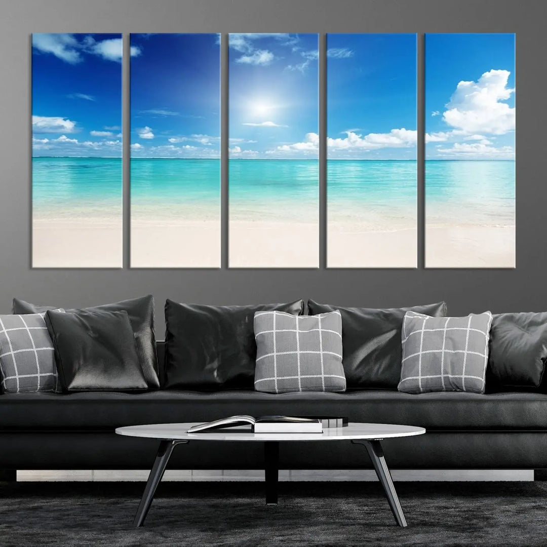 A contemporary living room showcasing the Wall Art Canvas Light Blue Beach and Ocean View.