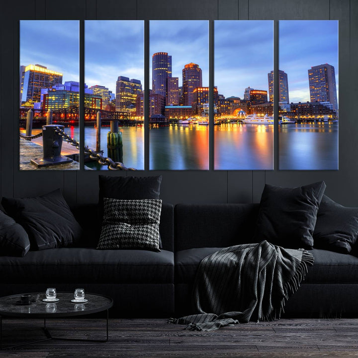 The Boston City Lights Sunset Cloudy Blue Skyline Cityscape View Wall Art Canvas Print embellishes a contemporary living room. This gallery-wrapped canvas set guarantees museum-quality canvases to enhance any space.