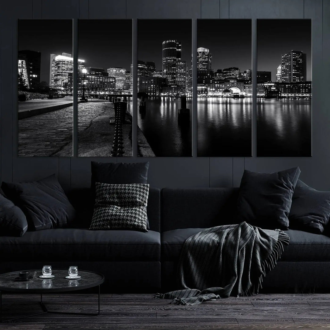 The Boston City Lights Skyline Black and White Wall Art Cityscape Canvas Print portrays a triptych of the city skyline at night reflecting on a calm river. This museum-quality canvas features UV-protective finishes to preserve its timeless allure.