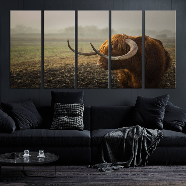 The "Big Cow Horn Wall Art Canvas Print" is a hand-assembled framed canvas depicting a Highland cow in a misty field. It is crafted with a UV-protective coating to ensure lasting vibrancy.