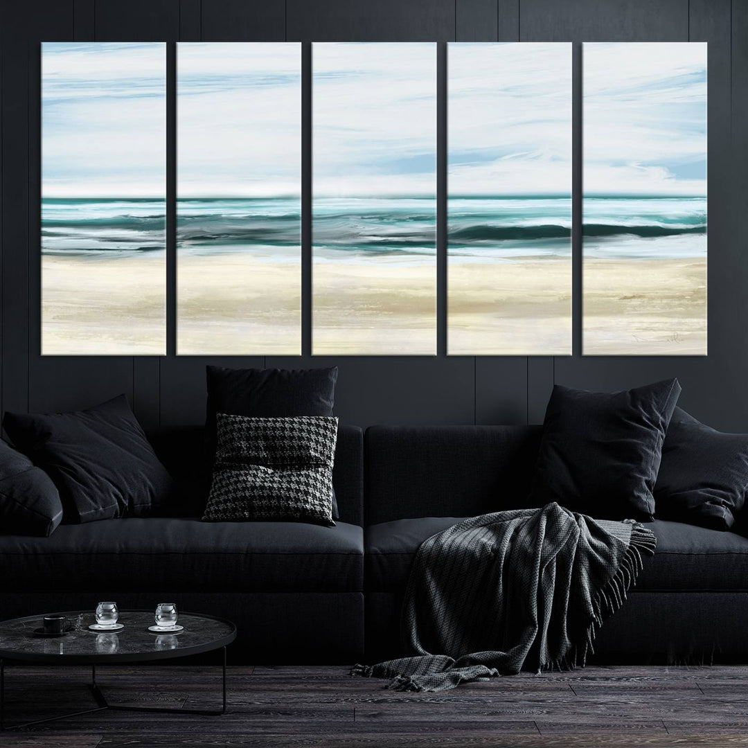 The room features the Ocean Abstract Wall Art Canvas Print, a triptych beach painting on museum-quality canvas with a gallery-wrapped finish and UV-protective coating.