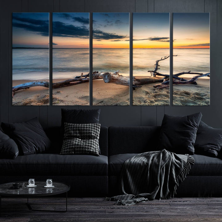 A captivating piece of Ocean Sunset Beach Wall Art Canvas Print, gallery wrapped, graces the gray wall.