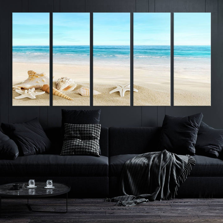 The "Turquoise Ocean View Seashell Starfish on the Beach Canvas Print Artwork" is a triptych piece that showcases a tranquil beach scene, complete with seashells and starfish adorning the sand. It is elegantly gallery-wrapped on museum-quality canvas.