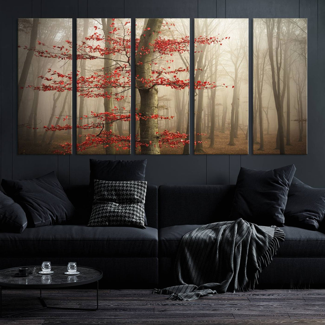 The living room features the Foggy Forest Wall Art, an Autumn Trees Canvas Print that showcases a serene nature scene with foggy woodland decor and a tree adorned in vibrant red leaves.