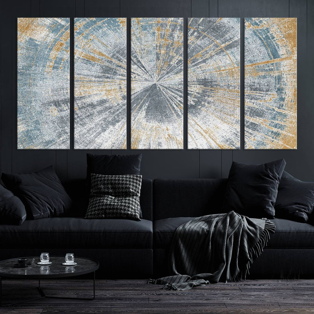 The Radiant Abstract Wood Rings Canvas Art, a modern triptych wall decor, enhances the contemporary style of the living room with its blue, white, and gold hues.