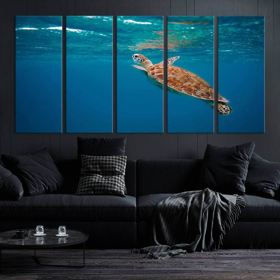 The living room features the "Baby Turtle in Ocean" wall art canvas print. This gallery-quality piece, depicting a sea turtle swimming underwater, adds an elegant touch to the space.