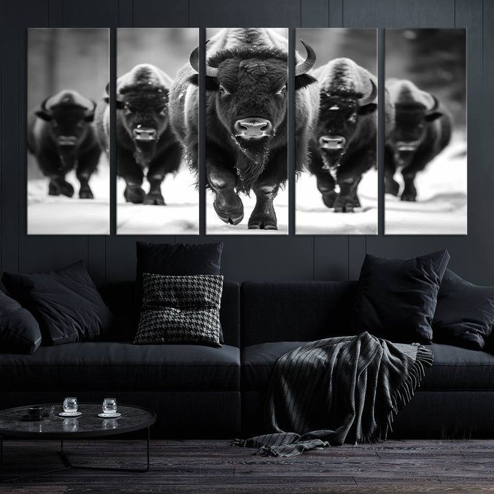 A modern living room features a striking black-and-white American Bison Art | Buffalo Herd Wall Art Canvas Print on the wall.