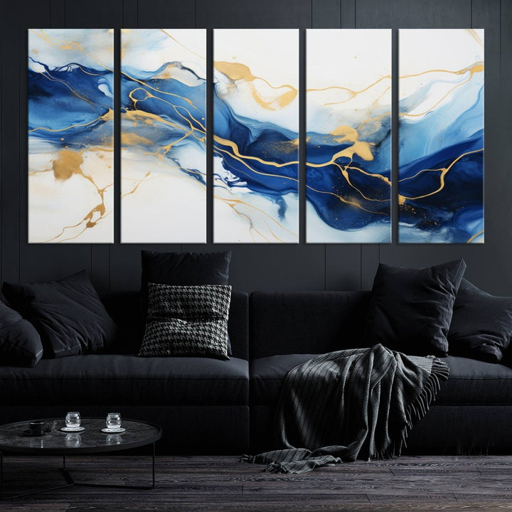 The Blue Abstract Wall Art is displayed as a triptych on museum-quality canvas, showcasing a blue and gold abstract design. The artwork includes a UV-protective coating to maintain its vibrancy and comes with the benefit of free shipping.